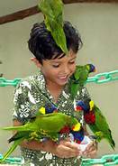 boy feeding birds